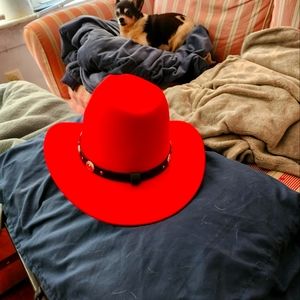 Red cowboy hat. Felt. Very vibrant and flattering